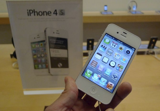 A white Apple iPhone 4S is shown on display at an Apple Store in Clarendon, Virginia.