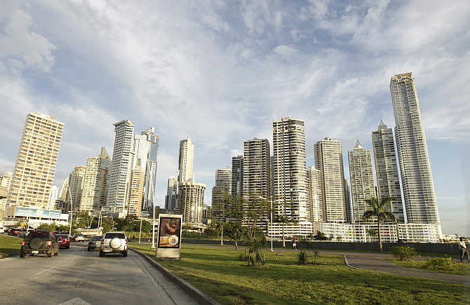 Vehicles drive on a street around the centre of Panama City, Panama.
