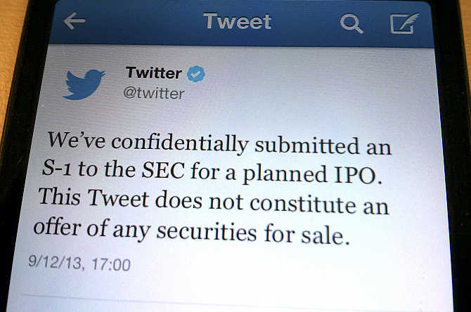 A tweet from Twitter announcing its initial public offering is shown in this photo illustration.