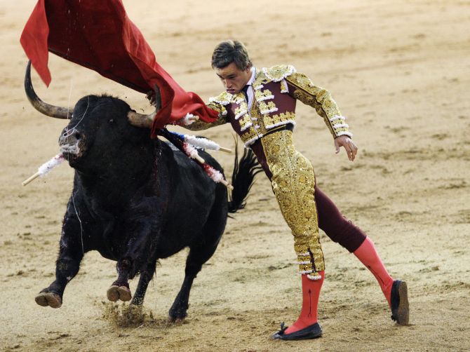 French bullfighter Juan Bautista Jalabert Fournie performs a pass during San Isidro's bullfighting fair at Madrid's Las Ventas bullring.