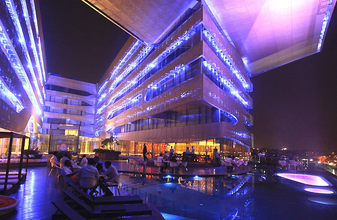Aqua, a bar popular with the upwardly mobile in Hyderabad. The fact that Harper's Bazaar, Rolls-Royce and BMW are doing well in India is all wonderful, but symptomatic of a nation where the total wealth of its billionaires is almost 10 per cent of the national GDP, down from 22 per cent at the peak just prior to the global financial crisis, says Ram Kelkar