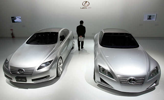 Toyota's Lexus brand concept vehicles LF-S, left, and LF-C, right, on display in Tokyo, Japan.