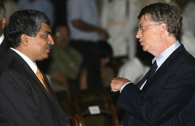 Nandan Nilekani (left) with Bill Gates. Will he, won't he?