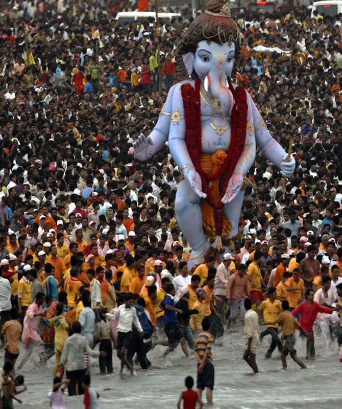 Devotees carry a statue of the Hindu elephant god Ganesh for immersion in the sea, on the last day of 'Ganesh Chaturthi', in Mumbai.