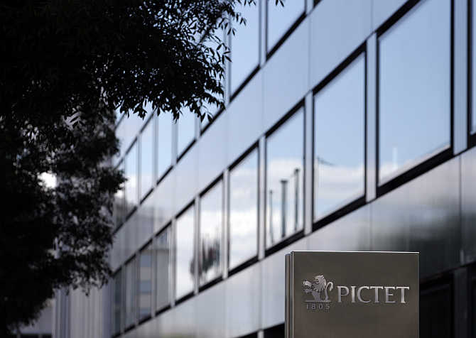 A sign bearing the logo of family owned private bank Pictet is pictured at the company headquarters in Geneva, Switzerland.