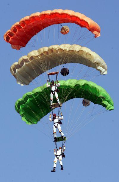 Indian Air Force sky divers form the Indian tri-colour at Hindon airport in Ghaziabad.