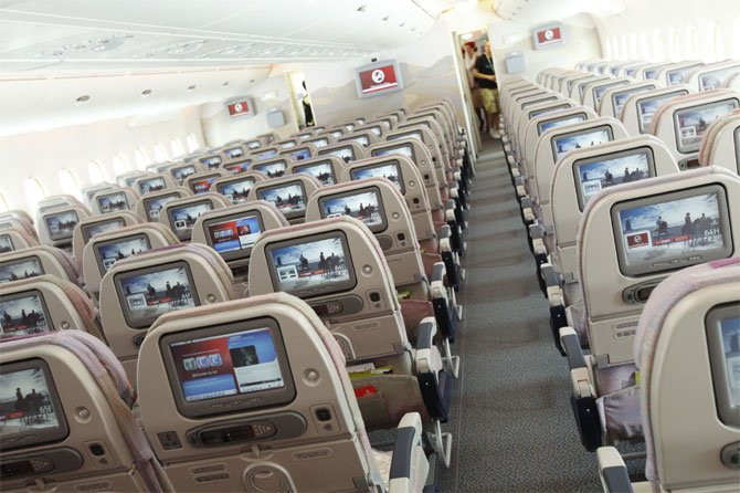 A picture shows the economy class section of an Airbus A380 passenger plane of Emirates Airline at the ILA International Air Show in Schoenefeld outside Berlin.