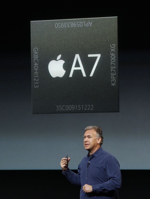 Phil Schiller, senior vice president of worldwide marketing for Apple Inc talks about the A7 chip during Apple Inc's media event in Cupertino, California.