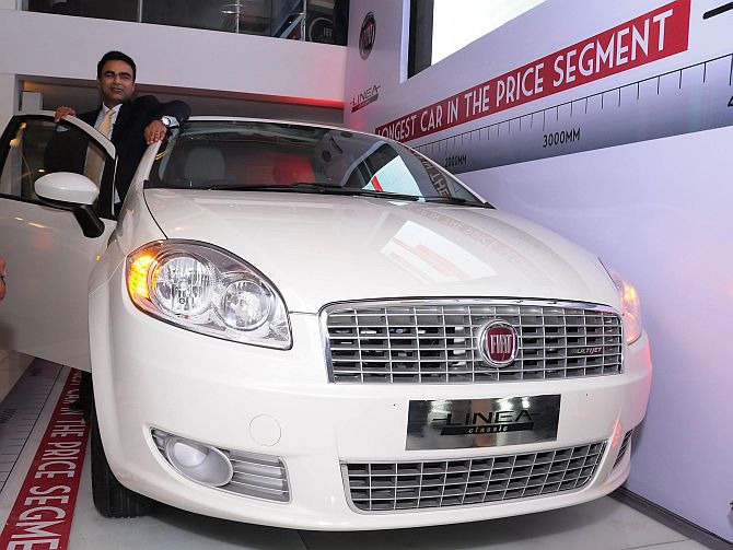  Mr. Nagesh Basavanhalli, President and Managing Director-FIAT Chrysler Operations India unveiling the new FIAT Linea Classic at FIAT Caffe, Delhi.