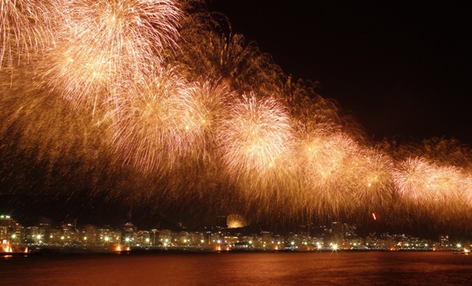 Fireworks explode above Copacabana beach in Rio de Janeiro, Brazil