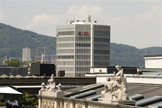 Logo of Switzerland's biggest bank UBS is seen at an office building in Zurich.