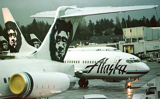 Alaska Airlines planes at a terminal at SeaTac Airport in Seattle, Washington, United States.