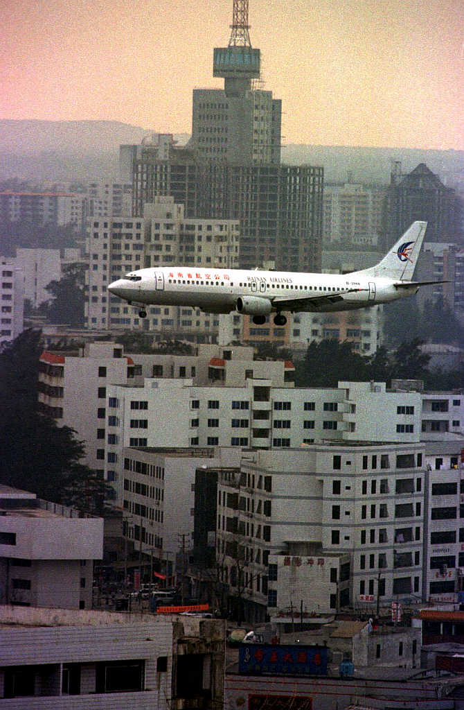A Hainan Airlines Boeing prepares to land at Haikou, capital of the southern island province of Hainan, China.