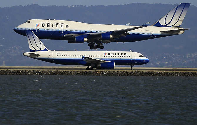 United Airlines planes take off and land at San Francisco airport, California, United States.