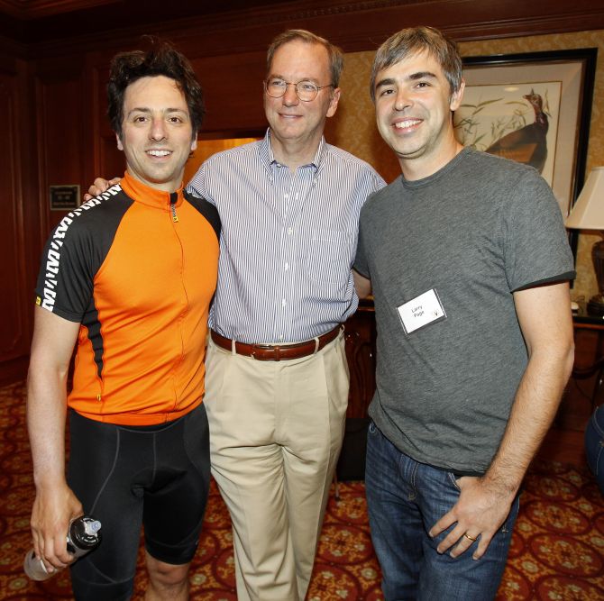 Google Executive Chairman Eric Schmidt (C) poses with co-founders Sergey Brin ( L) and Larry Page.