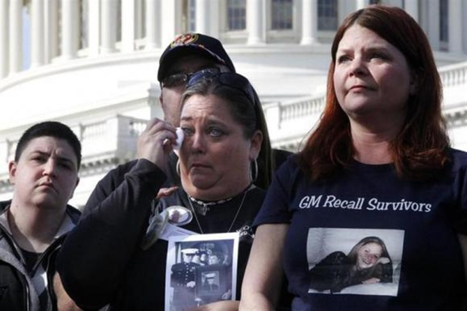 Crash survivor Samantha Denti and grieving mothers Kim Langley and Laura Christian join fellow family members of victims of the GM recall failure for a news conference on the U.S. Capitol grounds in Washington.