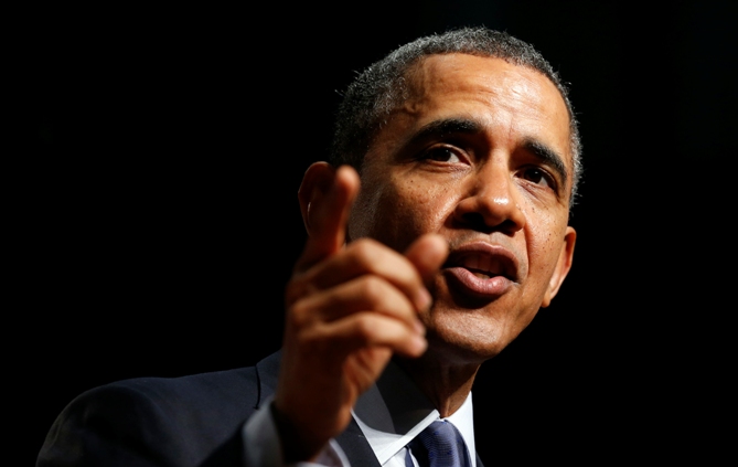 US President Barack Obama speaks during a visit to Bladensburg High School in Bladensburg, Maryland April 7, 2014. 