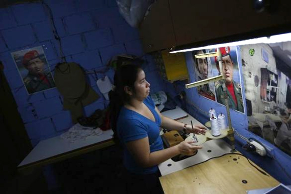 Maria works in a sewing workshop in her apartment.