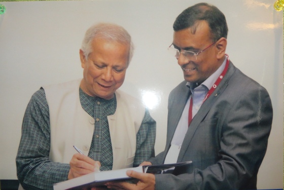 Nobel Peace Prize winner, Muhammad Yunus, with Chandra Shekhar Ghosh. 