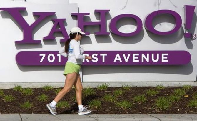 A woman jogs in front of Yahoo! headquarters in Sunnyvale, California.