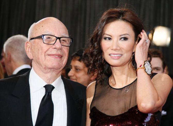 Rupert Murdoch, chairman and CEO of News Corporation, arrives with his wife Wendi Deng at the 85th Academy Awards in Hollywood.
