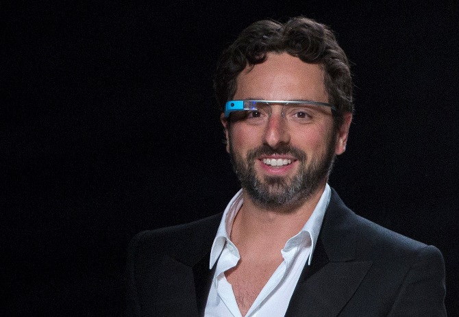Google co-founder Sergey Brin walks the runway wearing new product 'Glass by Google'.