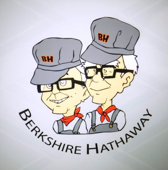 Berkshire Hathaway chairman Warren Buffet (R) and vice-chairman Charlie Munger are depicted as railroad engineers on a sign at the Borsheims jewellery store in Omaha.