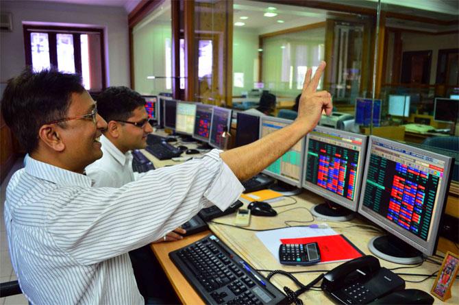 Sensex, Nifty hit report highs after US Fed cuts rates of interest; banks acquire