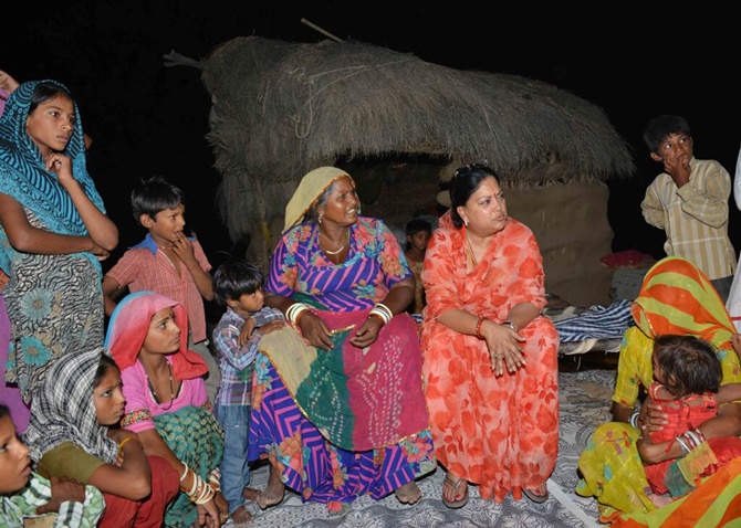 Rajasthan chief Minister Vasundhara Raje with villagers.