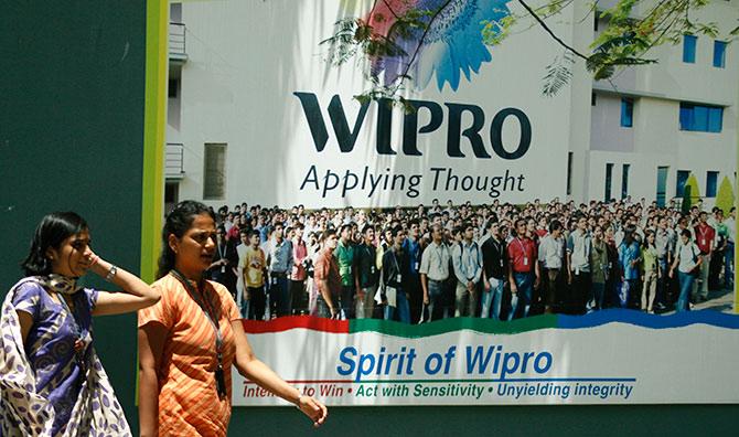 People walk in the Wipro campus in Bangalore.