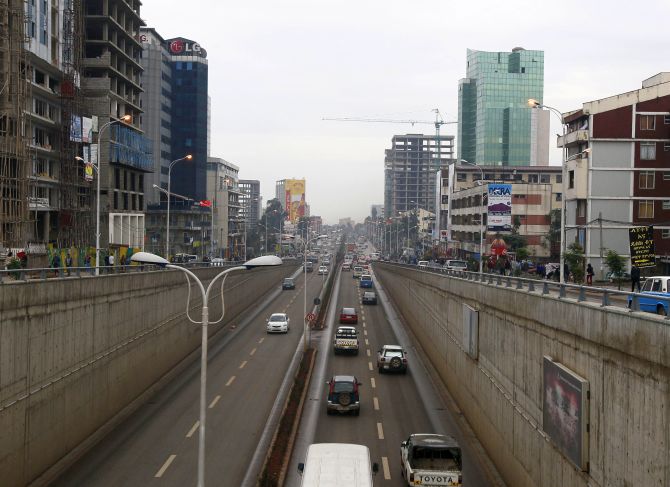 Cars drive out of an underpass in Addis Ababa.