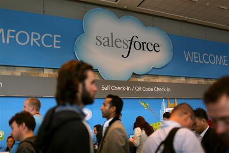 A Salesforce sign is seen as attendees make their way through Moscone Center during the company's annual Dreamforce event, in San Francisco, California.