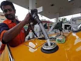 A worker at a petrol pump.