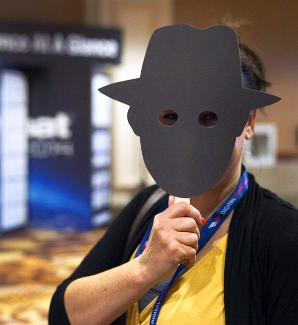 A marketing events manager at the Black Hat USA 2014 hacker conference. Photograph: Steve Marcus/Reuters