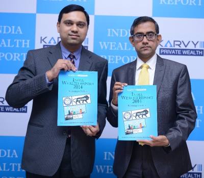 Sunil Mishra, CEO and Varun Saxena, head, Marketing, Karvy Private Wealth unveiling the India Wealth Report 2014: Reforming to Perform