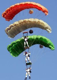 Indian Air Force sky divers form the Indian tri-colour at Hindon airport in Ghaziabad.
