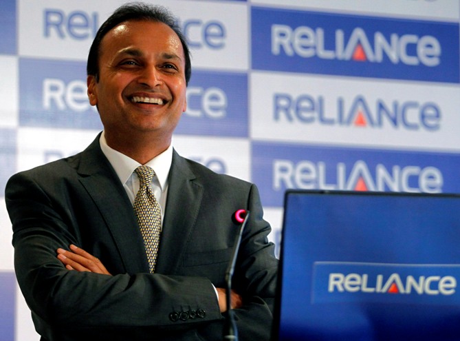 Anil Ambani, chairman of the Reliance Anil Dhirubhai Ambani Group, smiles during a news conference in Mumbai.