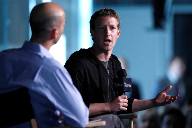 Facebook CEO Mark Zuckerberg (R) speaks during an onstage interview with James Bennet (L) of the Atlantic Magazine in Washington.