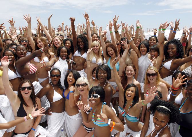 Some of the 530 bikini girls pose for a picture during an attempt to set a new world record for the most bikini-clad people in one photo shoot at the Camps Bay beach, Cape Town.