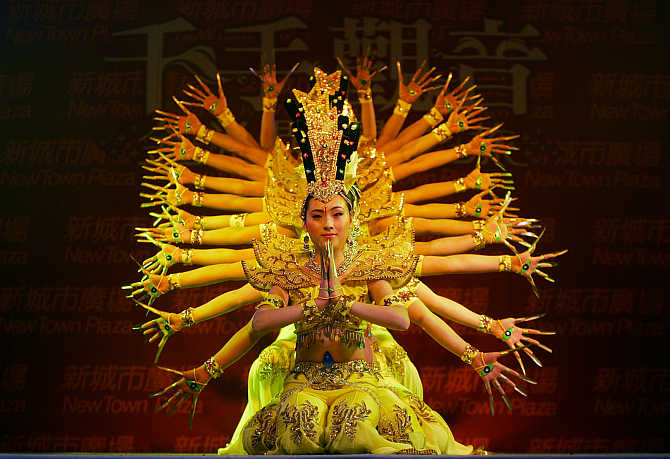 Chinese dancers perform at a shopping mall in Hong Kong.
