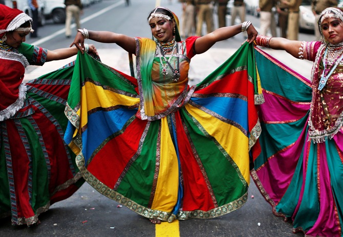 Dancers perform during celebrations outside the headquarters of Bharatiya Janata Party in New Delhi December 8, 2013.