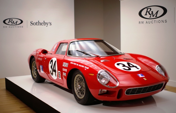 A 1964 Ferrari 250 LM (estimated $12-$15 million) is on display during a media preview of the 'Art of Automobile' auction at Sotheby's auction house in New York, November 18, 2013.