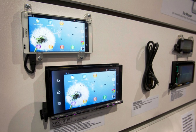 A Sony AV receiver with Bluetooth (below), using MirrorLink to synchronize with a Sony smartphone, is on display in the automotive electronics section of the Consumer Electronics Show in Las Vegas January 8, 2013. 