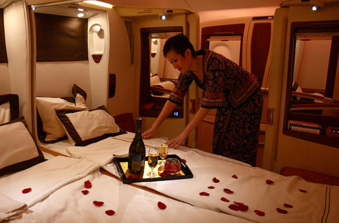 A crew member of Singapore Airlines A380 is preparing the cabin for passengers to experience ultimate comfort.