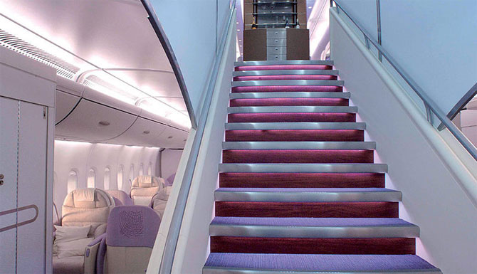 The A380 cabin, with stair case at foreground. 