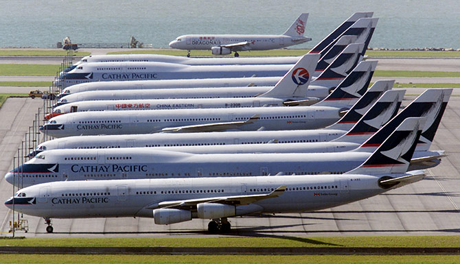 A column of Cathay Pacific Airways planes at the Hong Kong international airport.