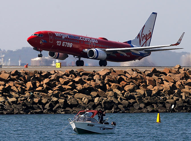 A Virgin plane takes off from Kingsford Smith airport in Sydney.