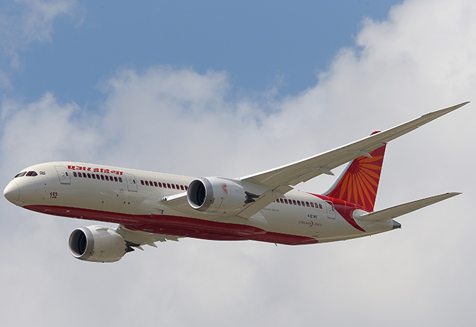 An Air India Airlines Boeing 787 dreamliner takes part in a flying display during the 50th Paris Air Show at the Le Bourget airport near Paris.