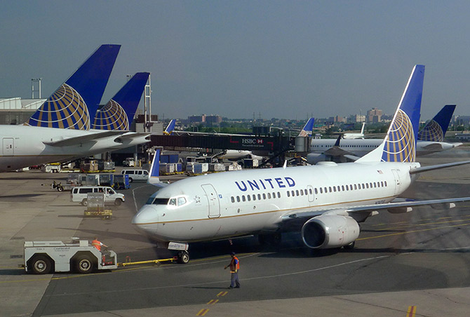 A United Airlines airplane is towed to a gate after arriving at Newark Liberty International Airport in Newark.