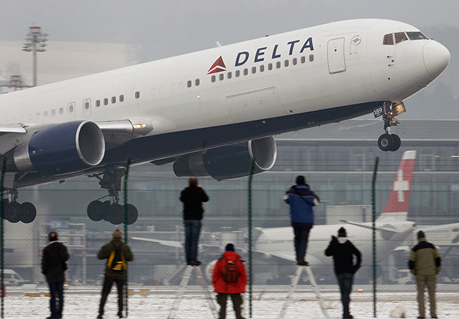 A Boeing 767 aircraft of Delta airlines takes-off from Zurich airport.